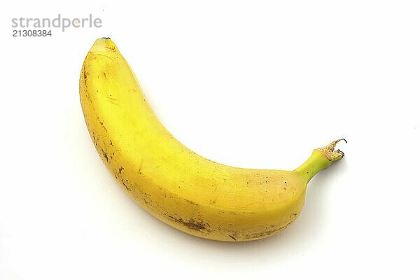 Banana with black spots isolated on white background. Overripe banana