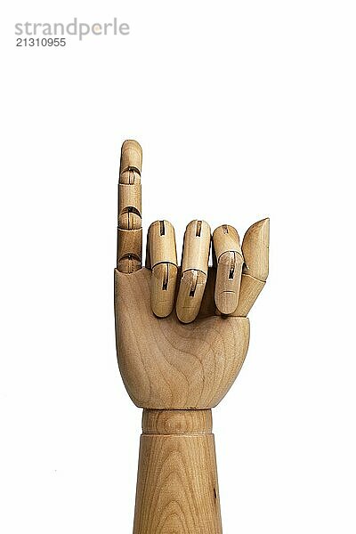 Artificial hand made of wood  in front of a white background