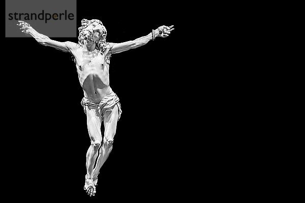 Jesus Christ  Old crucifix  Catholic Church  on black background with copy space