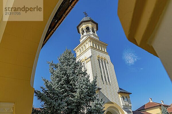 Beautiful view to the Coronation Reunification Cathedral Bell Tower in Alba Iulia city  Romania. A Bell Tower on a sunny day in Alba Iulia  Romania  Europe