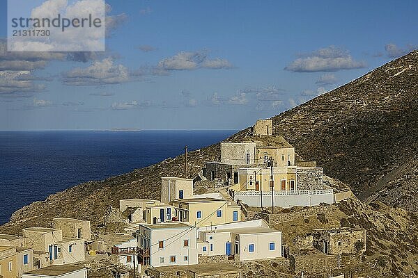 Greek village with sea and mountain views in an idyllic location  Colourful mountain village  Morning light  Olymbos  Karpathos  Dodecanese  Greek Islands  Greece  Europe