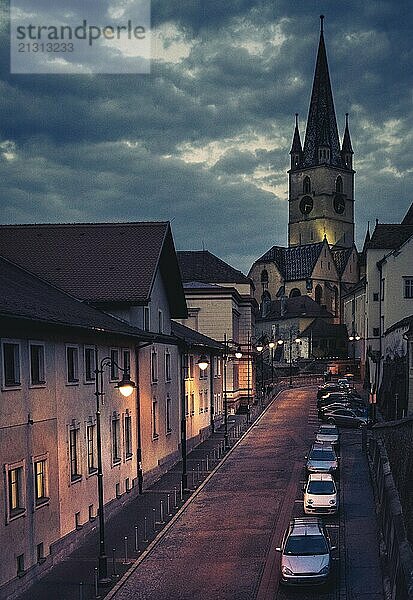 Beautiful medieval architecture with the Evangelical Church in background in Sibiu  Romania  Europe