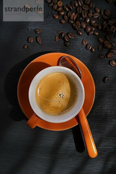 Presentation of a cup of coffee on a black background