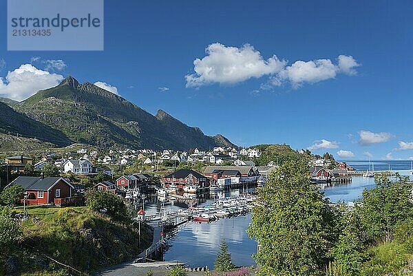 Panoramic view with fishing harbour and surrounding mountain landscape  Sorvagen  Lofoten  Norway  Europe