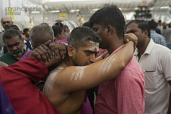 31.01.2018  Singapore  Republic of Singapore  The skin of a devout Hindu man is pierced with metal hooks in the back as he prepares for the Thaipusam festival procession at the Sri Srinivasa Perumal Temple in Little India  leading to the Sri Thendayuthapani Temple on Tank Road  4 kilometres away  Asia