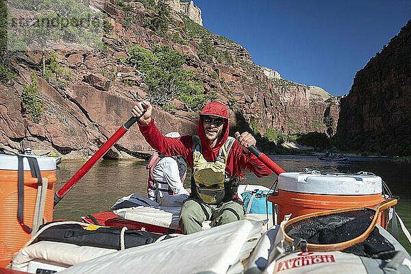 Dinosaur  Colorado  River rafters on the Green River in Dinosaur National Monument. Joey West  a guide for Holiday River Expeditions  rows his raft downstream