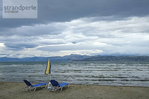 Kalamaki  Corfu  Greece  View from Kalamaki beach in the north-east of the Greek island of Corfu over the Ionian Sea towards mainland Albania  Europe