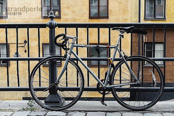 Stockholm  Sweden  August 8  2019: Bicycle parked in picturesque street in Ugglan quarter in Sodermalm  Europe