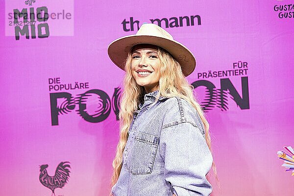 Anne West (Anne Heinz) on the red carpet in front of the Polyton 2024 award ceremony in Berlin's Atelier Gardens on 23 October 2024. The award has been held since 2023 and is a successor to the Echo music award