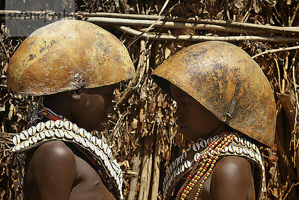 Two tribal Arbore in same traditional outfit.