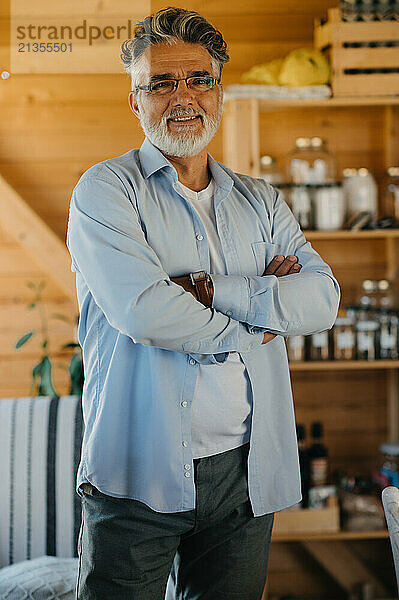 Handsome middle-aged man looking at camera.