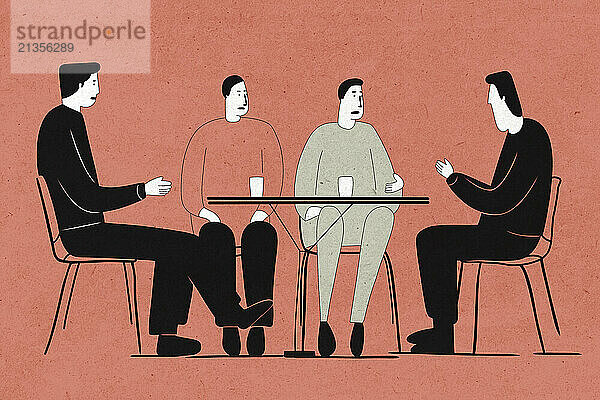 Businessmen having meeting at table in cafe