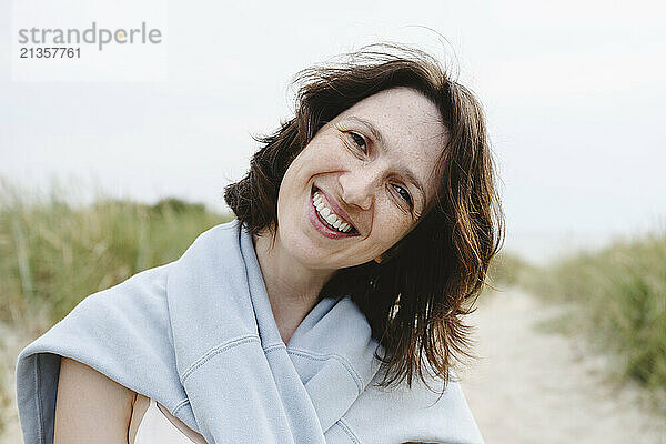 Cheerful woman at beach