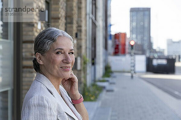 Smiling senior woman with gray hair