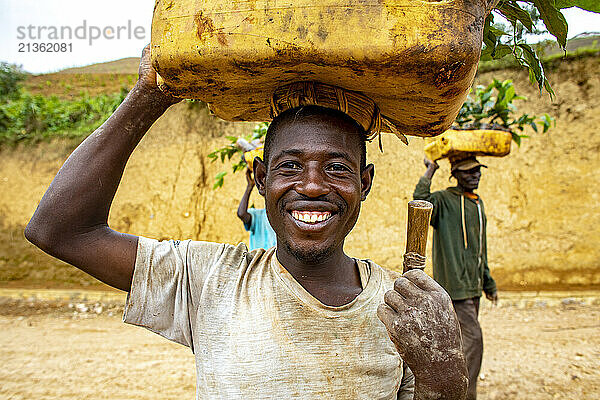 Pickers carrying tea tree saplings on their heads in western Rwanda