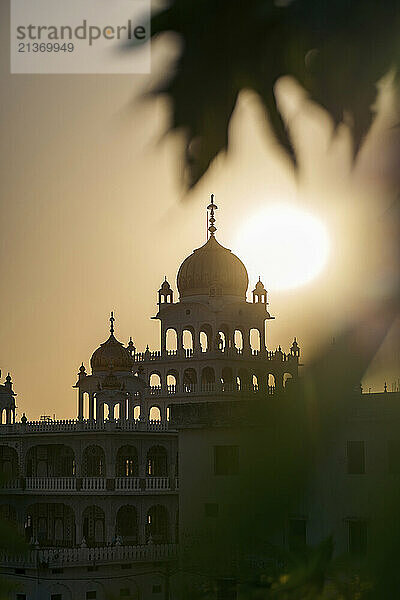 Gurudwara Maharani Chand Kaur in silhouette at sunset in Jammu  India; Jammu  Jammu and Kashmir  India