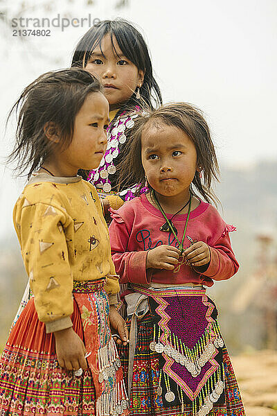 Cute young girls in traditional dress in Son La  Vietnam; Ban Nam Nghiep  Muong La  Son La  Vietnam