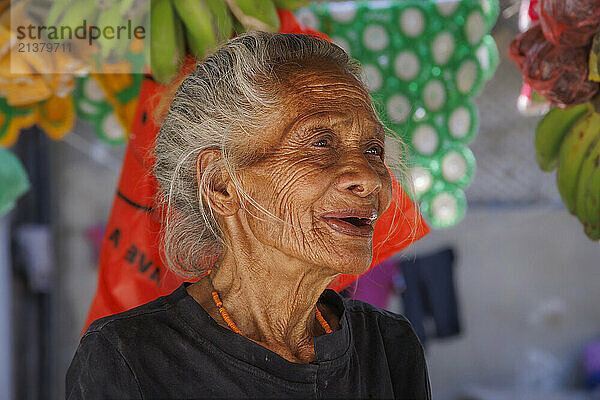 Close-up portrait of an elderly woman with a weathered face in a market in Baucau  Timor-Leste; Democratic Republic of Timor-Leste