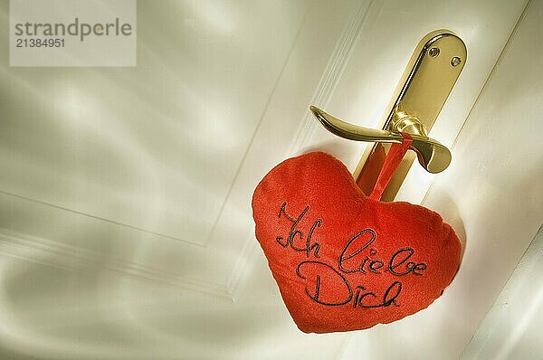 A heart with the lettering I love you hangs on a door handle  Federal Republic of Germany