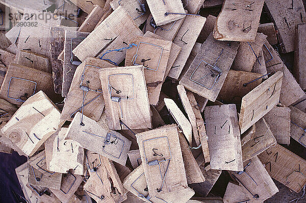 Home-made moustraps piled up at a market in Kashgar  China.