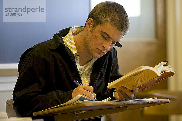 A high school boy studies during history class at Gould Academy  a private boarding school in Western Maine.