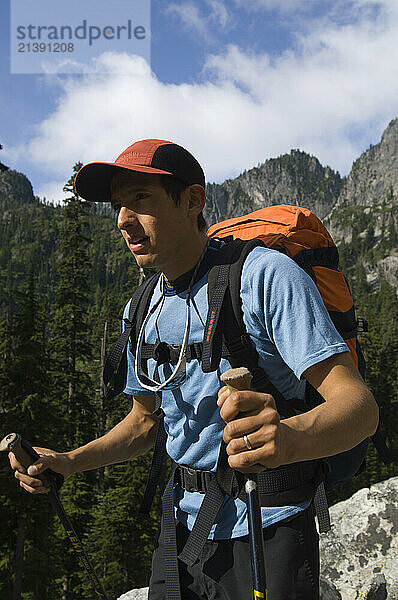 American Alpine Institue guide and former Ecudorian National climbing champ Pablo Puruncajas bound for the classic Cascade climb 'the Tooth' in the Mt Baker-Snoqualmie National Forest.