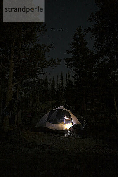 Two females backpacking Jewel Basin area of Montana's Flathead National Forest near Kalispell & Glacier National Park.