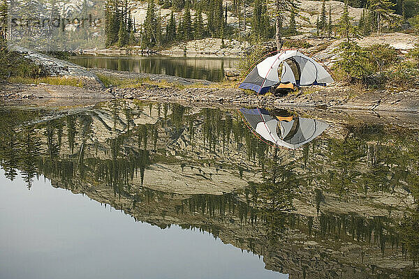 Two females backpacking Jewel Basin area of Montana's Flathead National Forest near Kalispell & Glacier National Park.