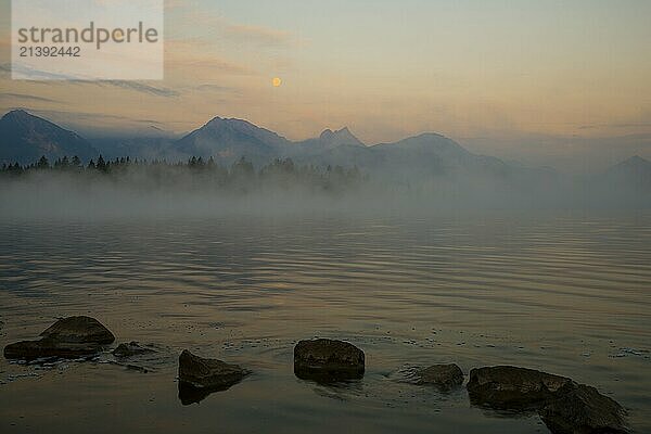 Morning atmosphere at full moon  Hopfensee  near Füssen  Ostallgäu  Allgäu  Upper Swabia  Swabia  Bavaria  Germany  Europe