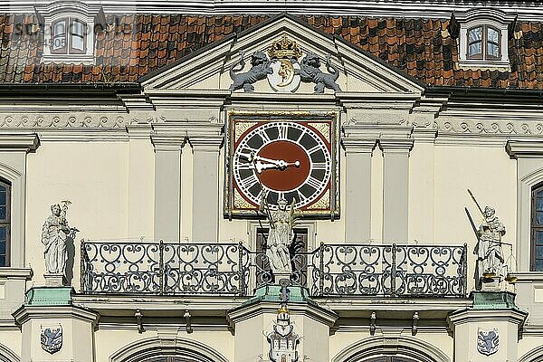 Detail with clock and balcony with figures from the baroque town hall Lüneburg at the Ochsenmarkt in the medieval old town of Lüneburg  Hanseatic city of Lüneburg  Lower Saxony  Germany  Europe