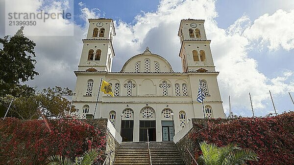 Church of the Resurrection  Analipseos Church  frontal view of a church with two towers and ascending staircase  clouds behind  visit of the Federal President Frank-Walter Steinmeier in Kandanos on 31 October 2024  Federal President  Frank-Walter Steinmeier  memorial  war crimes  Nazis  Wehrmacht crimes  World War II  Kandanos  Southwest Crete  Crete  Greek Islands  Greece  Europe