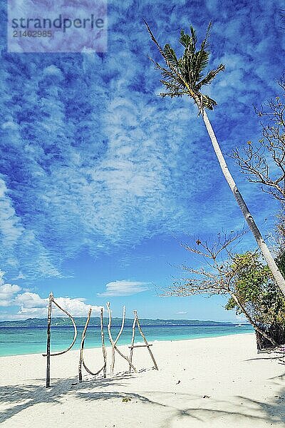 Puks beach wooden sign in boracay island philippines