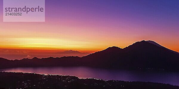 Amazing panorama view on sunrise and mountain from summit of Batur volcano  Bali  Indonesia  Asia