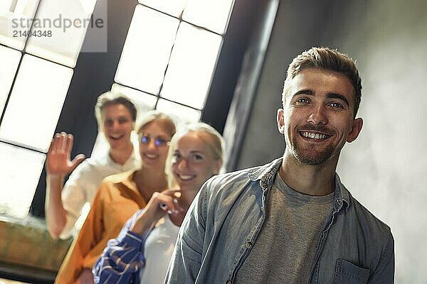 Close up photo of young business people stay together. Unity and teamwork concept