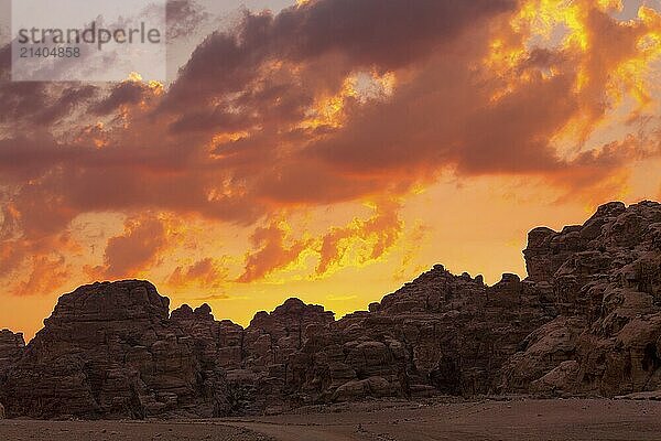 Sunset colorful orange sky landscape with sandstone rocks in Little Petra archaeological site  Jordan  Asia