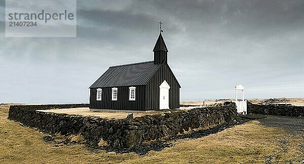 The famous and picturesque black church of Budir at Snaefellsnes peninsula region in Iceland. Long exposure photography