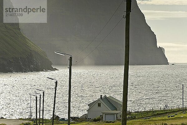 House and power lines  view from Vidareidi  Vidoy Island  Viðareiði  Viðoy Island  Faroe Islands  Denmark  Europe