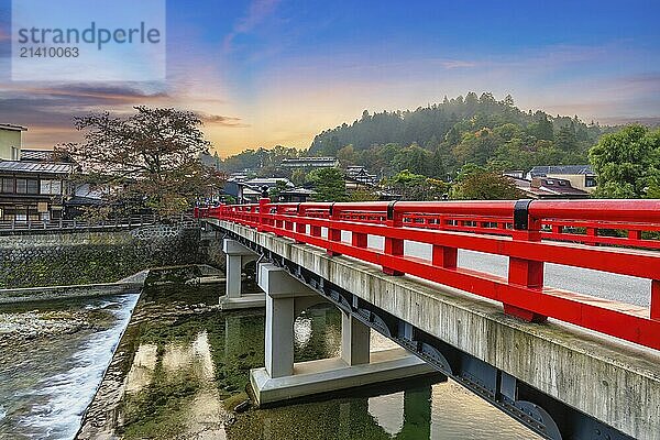 Takayama Gifu Japan  sunrise city skyline at Nakabashi red bridge and Miyagawa river in autumn season