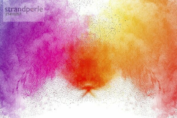 Multicolored powder explosion on white background.Purple red orange dust splash cloud on background. Launched colorful particles on background