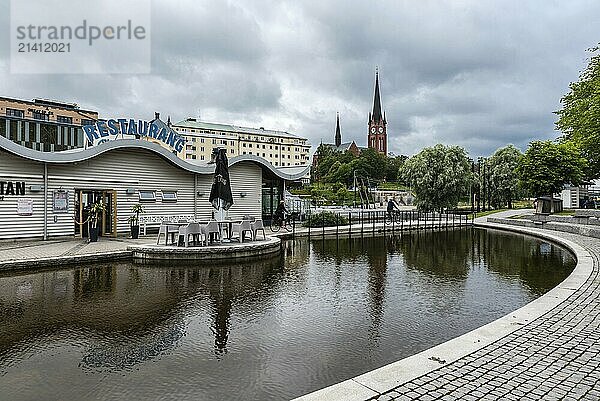 Sundsvall  Vastnorrland County  08 02 2019: Panoramic view over the water  the bridge and the church tower of old town