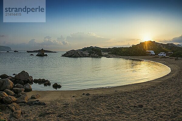 Lonely beach with granite rocks and campers  wild campsite  sunrise  Spiaggia Poltu Manzu  Capo Ceraso  near Olbia  Sardinia  Italy  Europe