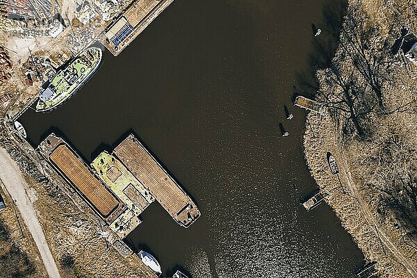 Yacht marina in harbour Sobieszewo Island. Aerial Drone view of the green district of Gdansk located on the Vistula River in spring