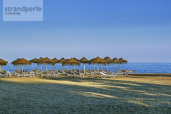 View of Beach in Torremolinos with umbrellas  Spain  Europe