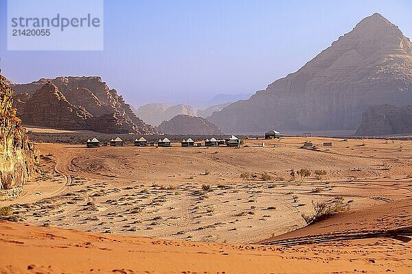 Camp site tents at Wadi Rum Desert  Jordan and red rocks landscape