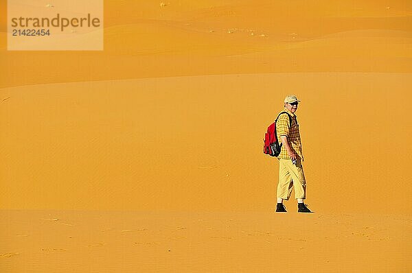 Man (50-55)  desert trekking  Erg Chebbi  Morocco  Africa