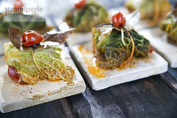 Presentation Of Tile Marl  Bundle Of Meat in Cabbage Leaves