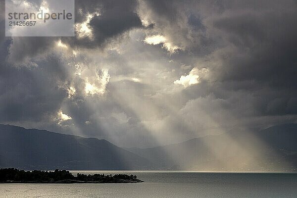 Turbulent sky above the Hardangerfjord as seen from the small village Herand in the Norwegian municipality Jondal