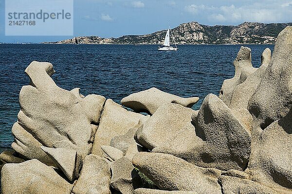 Bizarre granite rocks and sailing ship  Spiaggia del Faraglione  Palau  Costa Smeralda  Sardinia  Italy  Oceania