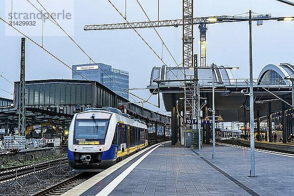 Modernisation of Duisburg Central Station  the platforms of the 13 tracks are being renewed  2 platforms are already finished  the old flat roofs are being replaced by a corrugated steel and glass roof  the conversion is taking place during ongoing operations  one platform is always closed  the conversion measure should be completed by 2028  Duisburg North Rhine-Westphalia  Germany  Europe