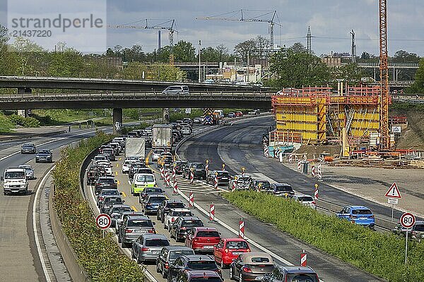 Duisburg  North Rhine-Westphalia  Germany  traffic jam on the A40 motorway at the Kaiserberg junction. The busy area with the A40 and A3 motorways has been undergoing renovation and expansion for years. There are always closures or restrictions for motorists there  Europe